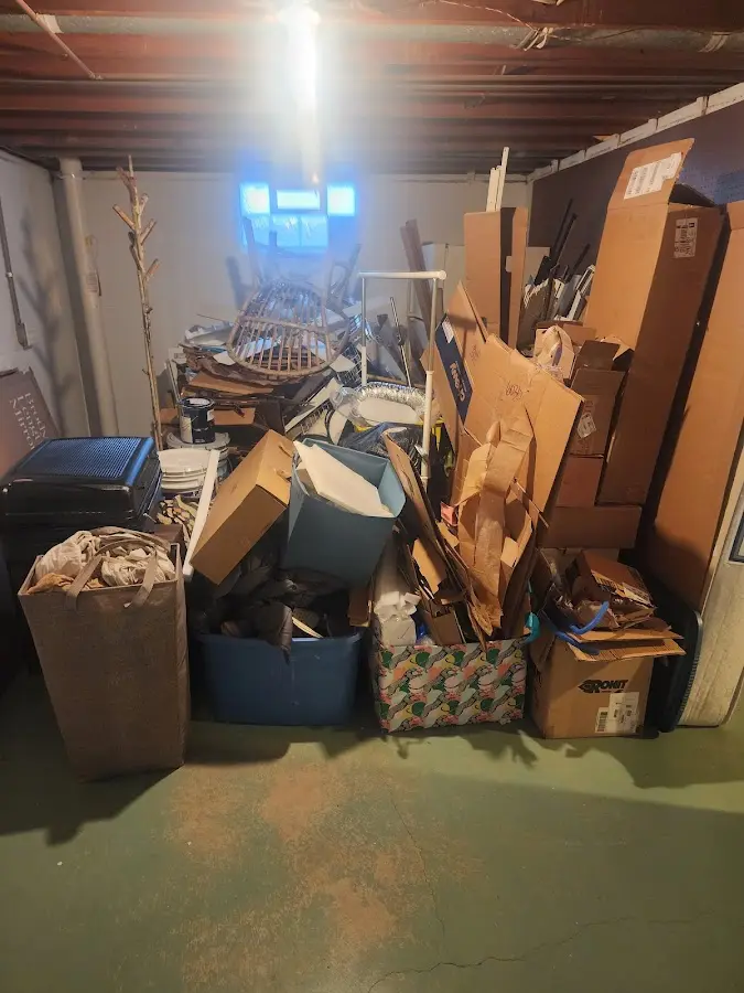 Roll-off dumpster container at job site for 2 Yard Dumpster Rental in Liberty Lake